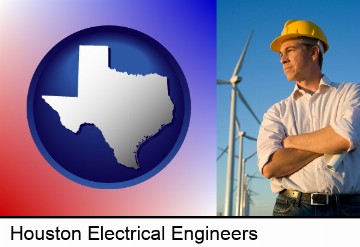 an electrical engineer, with windmills in the background in Houston, TX