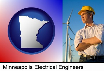 an electrical engineer, with windmills in the background in Minneapolis, MN