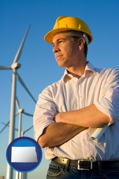 an electrical engineer, with windmills in the background - with North Dakota icon