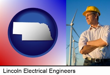 an electrical engineer, with windmills in the background in Lincoln, NE