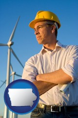 an electrical engineer, with windmills in the background - with IA icon